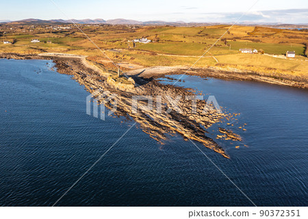 Aerial view of the amazing coast at St Johns Point next to Portned Island in County Donegal - Ireland. 90372351