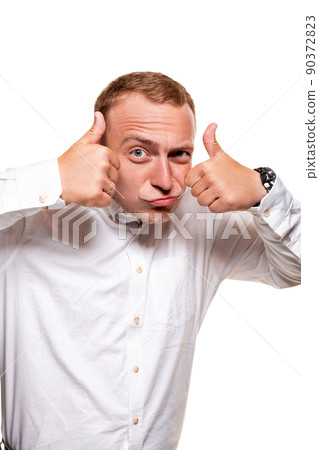 Handsome young blond man in a white shirt, isolated on a white background Handsome young blond man in a white shirt, isolated on a white background 90372823