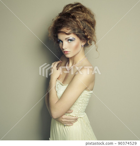 Portrait of beautiful  woman with elegant hairstyle 90374529