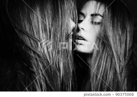 Beautiful sexy young woman near a mirror 90375008