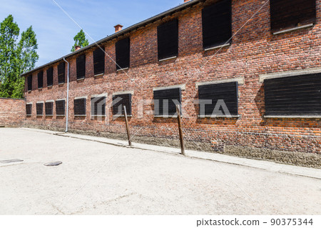 Auschwitz-Birkenau concentration camp buildings. Holocaust memorial. Oswiecim, Poland, 16 May 2022 90375344