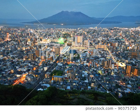 Night view of Kagoshima city from the sky above the forest of Takeoka Park 90375710