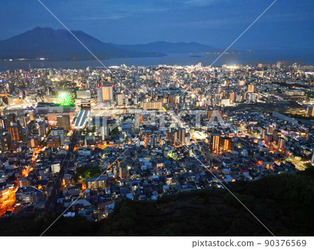 Night view aerial view of Kagoshima city area from the forest of Takeoka Park Night view aerial view of Kagoshima city area from the forest of Takeoka Park 90376569