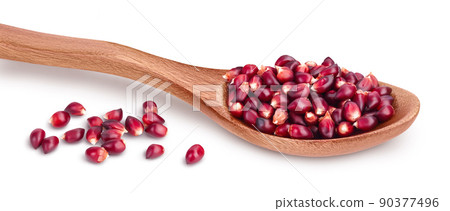 Purple corn seeds in wooden spoon isolated on white background with full depth of field Purple corn seeds in wooden spoon isolated on white background with full depth of field 90377496