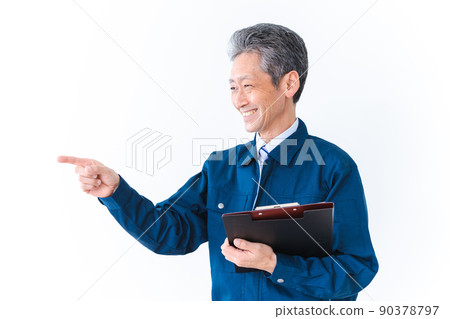 Elderly man in work clothes to check safety 90378797