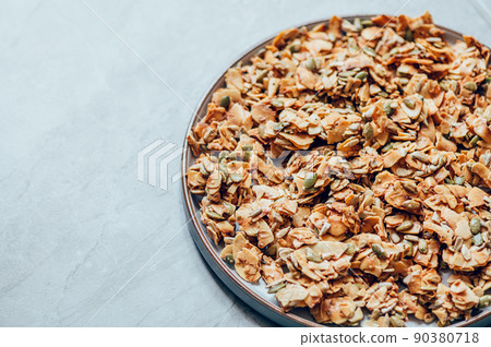 Healthy snacks frrom coconut and seeds 90380718