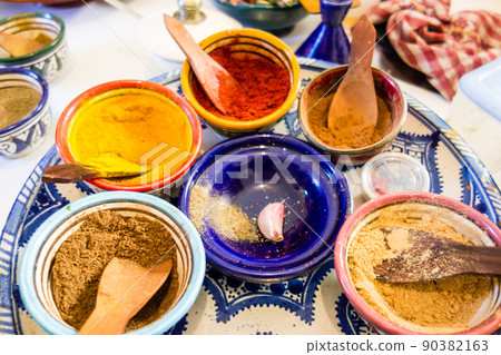 Various spices in colorful small bowls Preparing Moroccan dishes 90382163