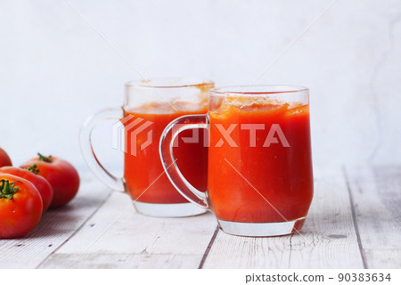 tomato sauce in a jar with fresh tomato on table tomato sauce in a jar with fresh tomato on table 90383634