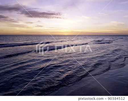 Dramatic sunset over the Cuban beach 90384512