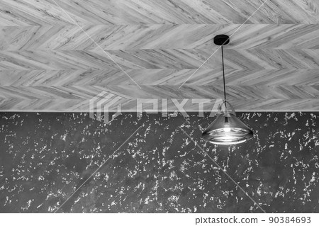 Pendant lamp in glass frame light on the ceiling in modern interior design with plastered grey wall background 90384693