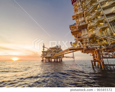 Offshore construction platform for production oil and gas. Oil and gas industry and hard work. Production platform and operation process by manual and auto function from control room. Offshore construction platform for production oil and gas. Oil and gas industry and hard work. Production platform and operation process by manual and auto function from control room. 90385572