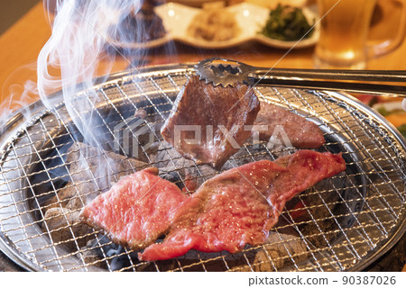 Charcoal grilled meat 90387026
