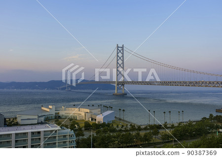 Akashi Kaikyo Bridge, Japan at dawn 90387369