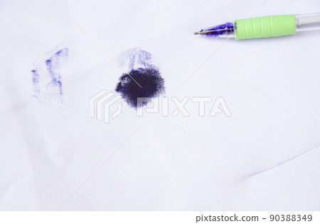 Dirty blue ink stain on bag shirt  from using pen in daily life activity. dirty stains for cleaning  90388349