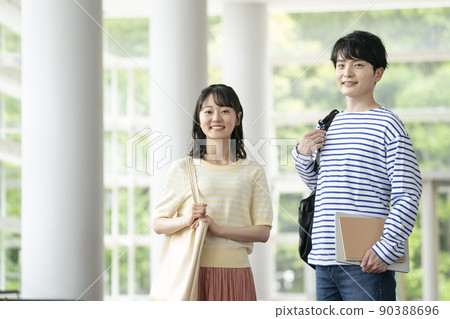 College student image: Young men and women smiling looking at the camera 90388696