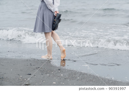 Schoolgirl on the beach Schoolgirl on the beach 90391997