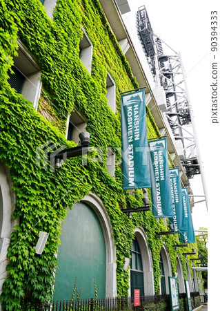 Hyogo Nishinomiya Hanshin Koshien Stadium Ivy and Lighting Tower (light side, early summer) 90394333