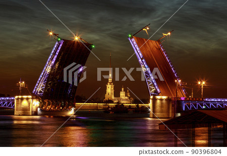 Raised Palace bridge over river Neva. Raising of bridges in Saint-Petersburg, Russia. Summer white night. Raised Palace bridge over river Neva. Raising of bridges in Saint-Petersburg, Russia. Summer white night. 90396804