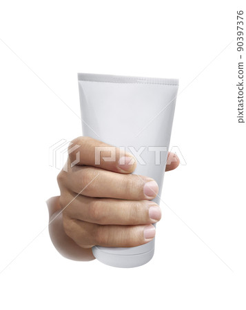 Human hand holding Cosmetic plastic tube isolated on white background Human hand holding Cosmetic plastic tube isolated on white background 90397376