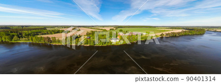 Aerial panoramic view of river Kymijoki bank with beautiful wooden Rabbelugn Manor - Takamaan Kartano. 90401314