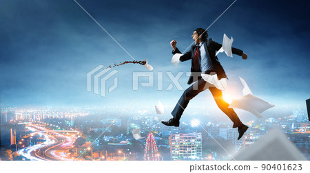Portrait of energetic businessman running 90401623
