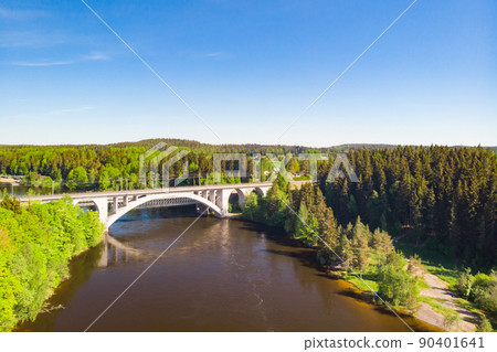 Summer aerial view of bridge and Kymijoki river waters in Finland, Kymenlaakso, Kouvola, Koria 90401641