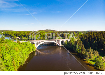 Summer aerial view of bridge and Kymijoki river waters in Finland, Kymenlaakso, Kouvola, Koria 90401642