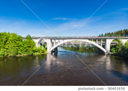Summer aerial view of bridge and Kymijoki river waters in Finland, Kymenlaakso, Kouvola, Koria 90401656
