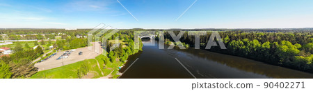 Summer panoramic aerial view of bridge and Kymijoki river waters in Finland, Kymenlaakso, Kouvola, Koria 90402271