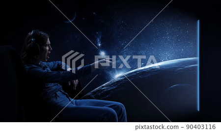 Young woman watching movie . Mixed media Young woman watching movie . Mixed media 90403116