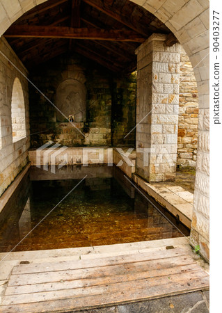 Holy spring in Lyadovsky rocky monastery, Ukraine Holy spring in Lyadovsky rocky monastery, Ukraine 90403277
