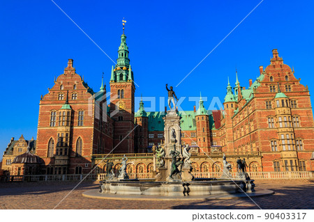 Neptune Fountain in a front of Frederiksborg castle in Hillerod, Denmark Neptune Fountain in a front of Frederiksborg castle in Hillerod, Denmark 90403317