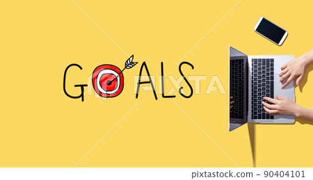 Goal concept with person working with laptop 90404101