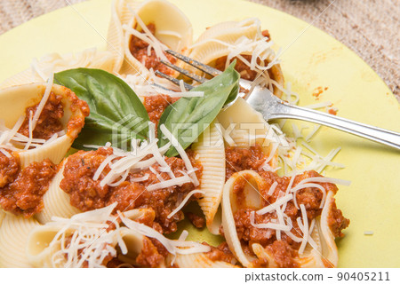 shell type pasta dish with meat served on table shell type pasta dish with meat served on table 90405211