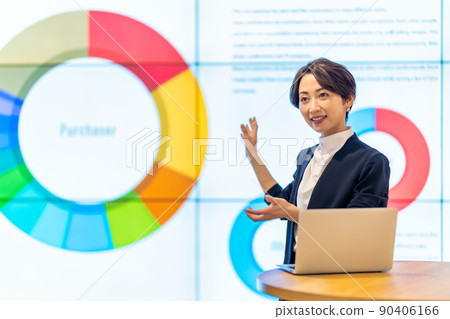 Charismatic middle-aged woman presenting at a seminar 90406166