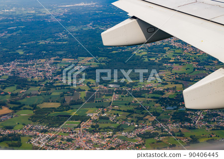 Plain wing over Belgium. Flight from Amsterdam Stock Photo