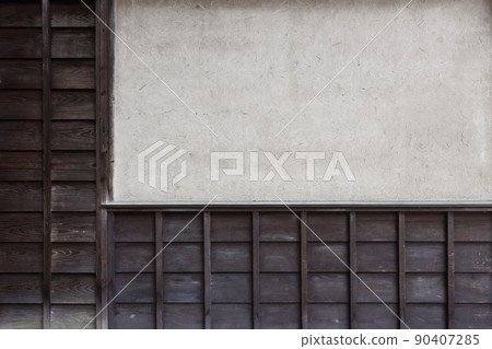 Dirty board walls and earthen walls of old folk houses 90407285