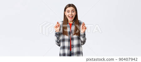 Lifestyle, different emotions, leisure activities concept. Excited and happy young attractive woman hear great news, rehoicing, congratulating friend, smiling upbeat and jumping from joy Lifestyle, different emotions, leisure activities concept. Excited and happy young attractive woman hear great news, rehoicing, congratulating friend, smiling upbeat and jumping from joy 90407942