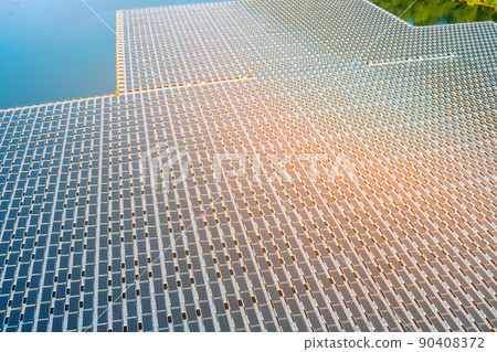 Solar power farm station the floating in lake an aerial top view Solar power farm station the floating in lake an aerial top view 90408372