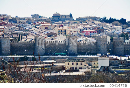A distant view of the fortified city of Avila, Spain, a World Heritage Site from Quattro Postes 90414756