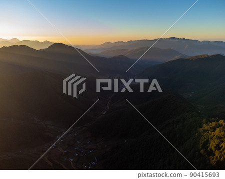 Sunrays Slanting over the Hills 90415693