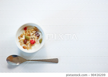 Yogurt with fruit granola topping Yogurt with fruit granola topping 90416209