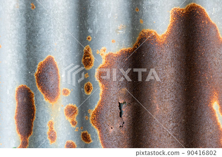 Grunge silver and red rust corrugated iron metal plate textured background Grunge silver and red rust corrugated iron metal plate textured background 90416802