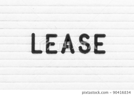 Black color letter in word lease on white felt board background Black color letter in word lease on white felt board background 90416834