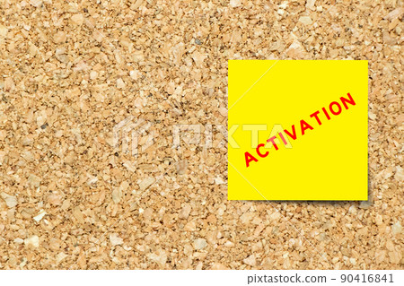Yellow note paper with word activation on cork board background with copy space Yellow note paper with word activation on cork board background with copy space 90416841