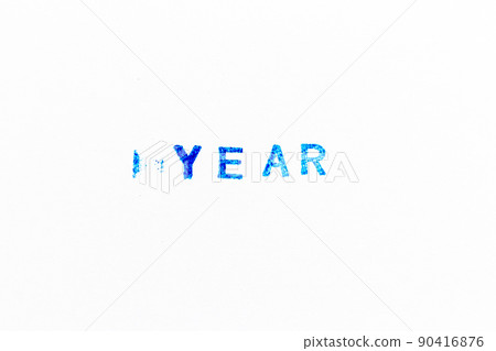 Blue color ink of rubber stamp in word year on white paper background 90416876