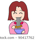 A woman eating soba 90417762