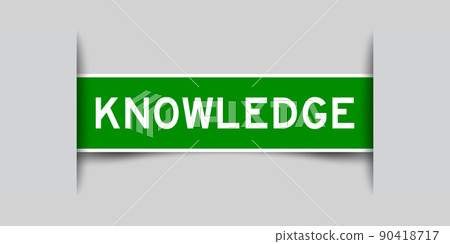 Inserted green color label sticker with word knowledge on gray background 90418717