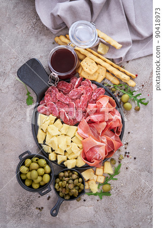 Italian antipasto meat platter - prosciutto ham, bresaola, salami and parmesan Italian antipasto meat platter - prosciutto ham, bresaola, salami and parmesan 90418973