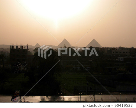 Dusk of Giza's Three Great Pyramids, Egypt 90419522
